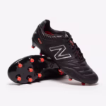 New Balance 442 V2 Pro FG soccer cleats in black and red colorway