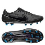 Close-up of Nike Tiempo Legend 9 Elite FG soccer cleats in black and blue colorway