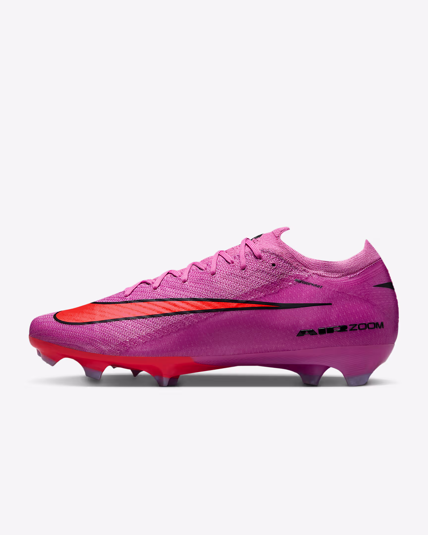 Nike Mercurial Vapor 16 Elite soccer cleats in vibrant pink and orange with black accents – firm ground speed-focused boots