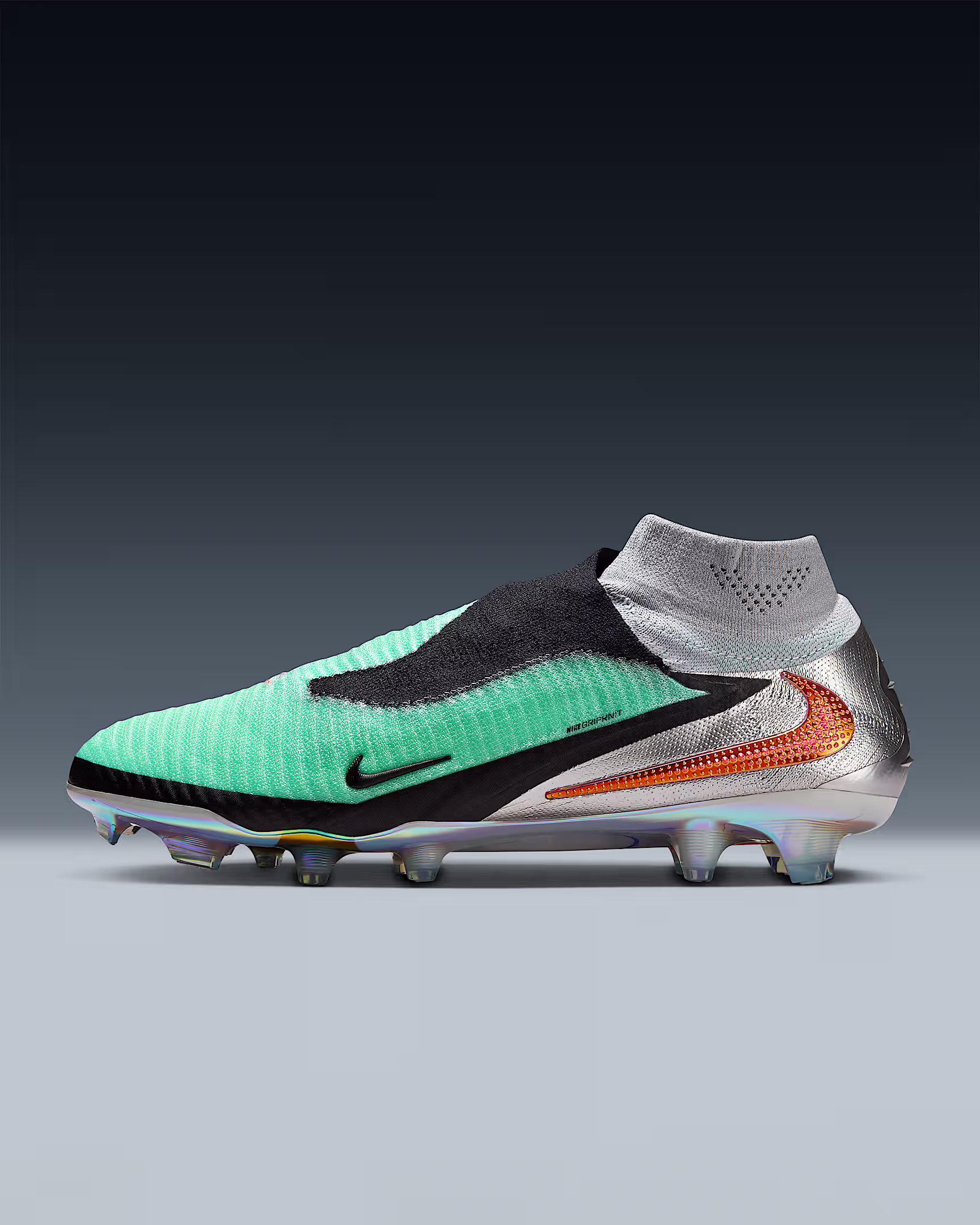 Nike Phantom 6 High Elite FG/Ag – laceless green soccer cleats with sock collar and orange Swoosh, built for control and precision