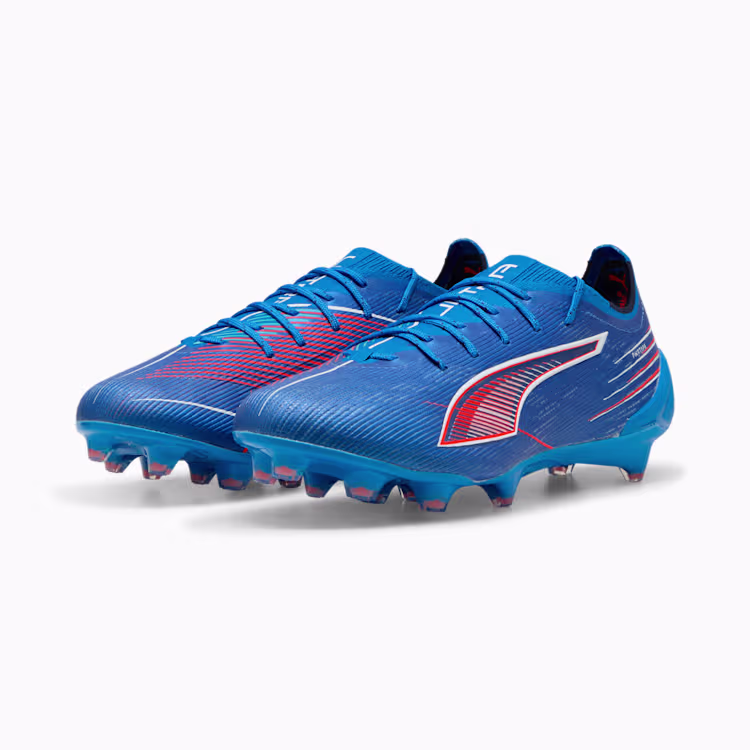 Puma Ultra 6 Ultimate FG in Ultra Blue and Glowing Red – lightweight firm ground soccer cleats built for speed