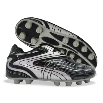 Vizari Youth Striker firm ground soccer cleats – black and white kids cleats, sole and side view