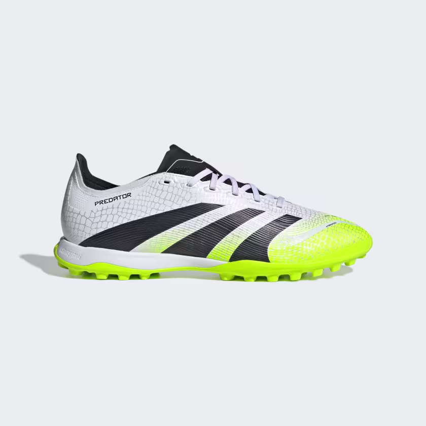 Adidas Predator League TF soccer shoes in white with black stripes and a bright neon yellow sole, designed for turf fields.