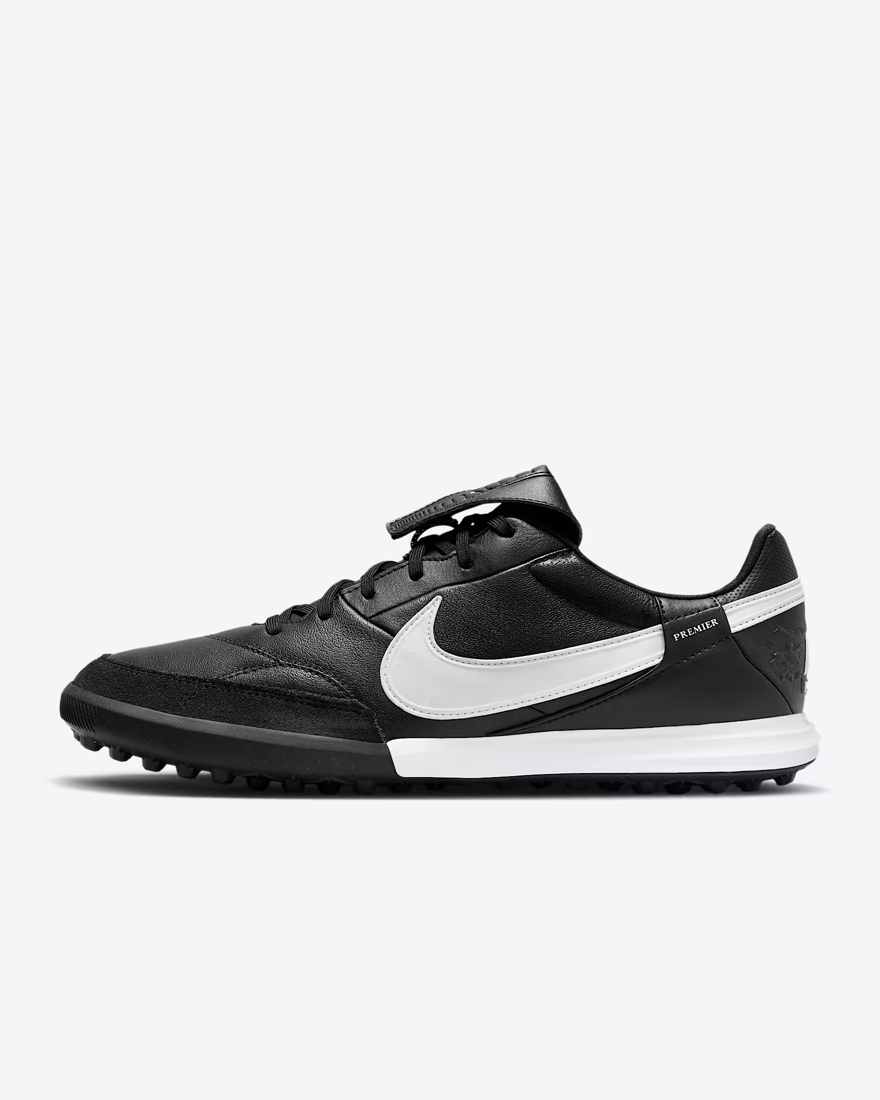Nike Premier 3 TF black turf soccer shoes with white swoosh, designed for artificial turf and hard ground surfaces.