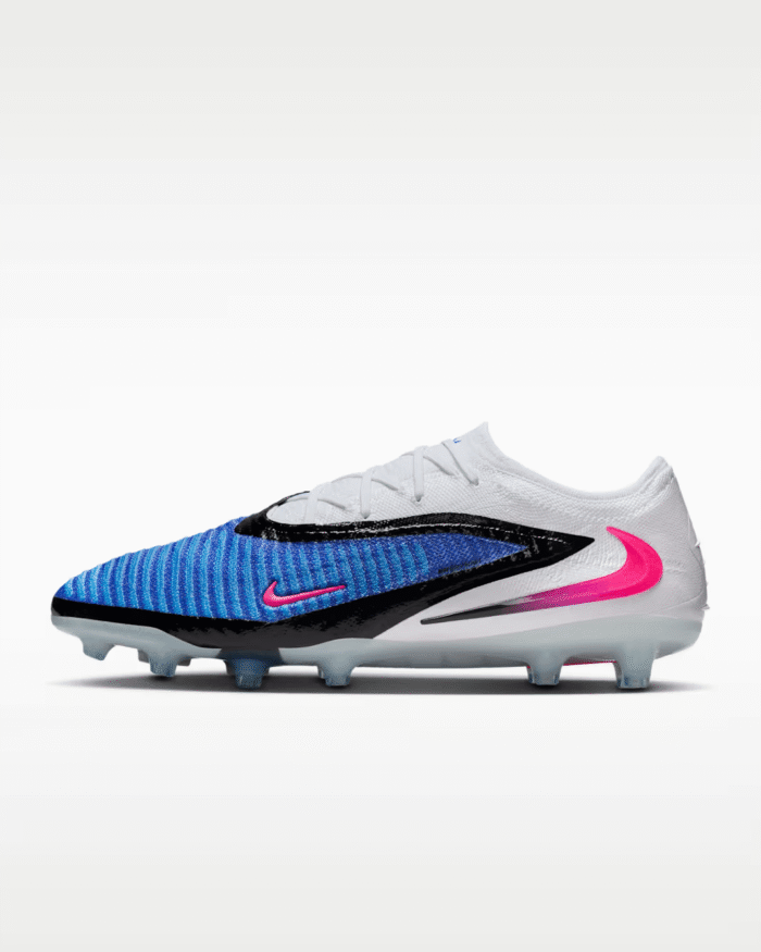 Nike Phantom 6 Low Elite AG soccer cleats in blue, white, and pink with artificial grass studs.
