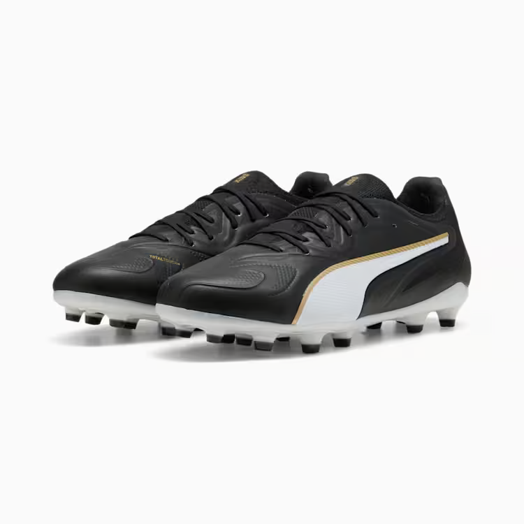 Puma King 20 Ultimate 2026 soccer cleats in black with white Puma Formstrip, featuring a classic leather upper and firm ground soleplate.