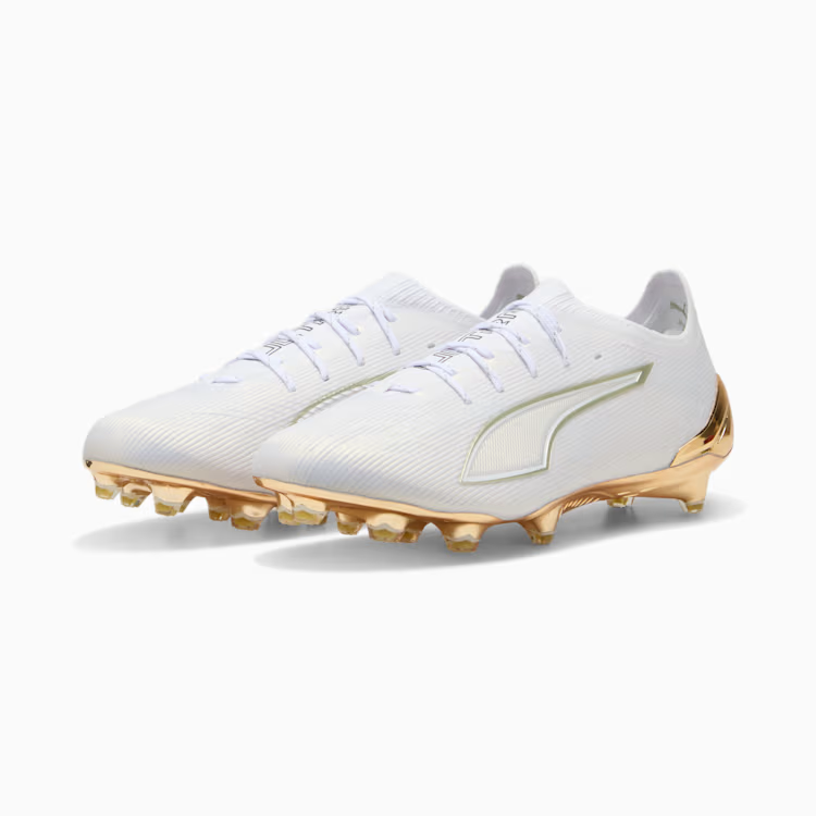 Puma Ultra 6 Ultimate Firm Ground soccer cleats in a white colorway with a lightweight speed upper and FG stud configuration.