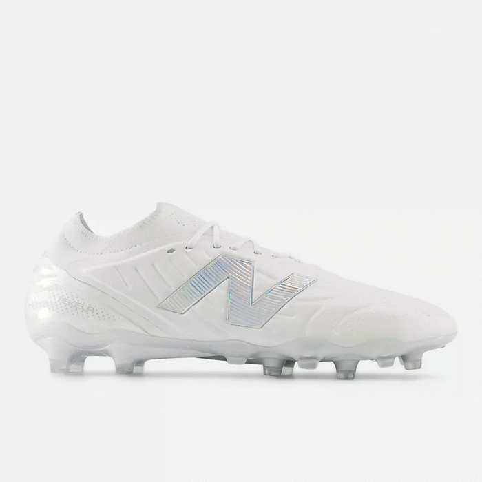 New Balance Tekela Elite Low FG V5 soccer cleats in white with silver N logo for firm ground.